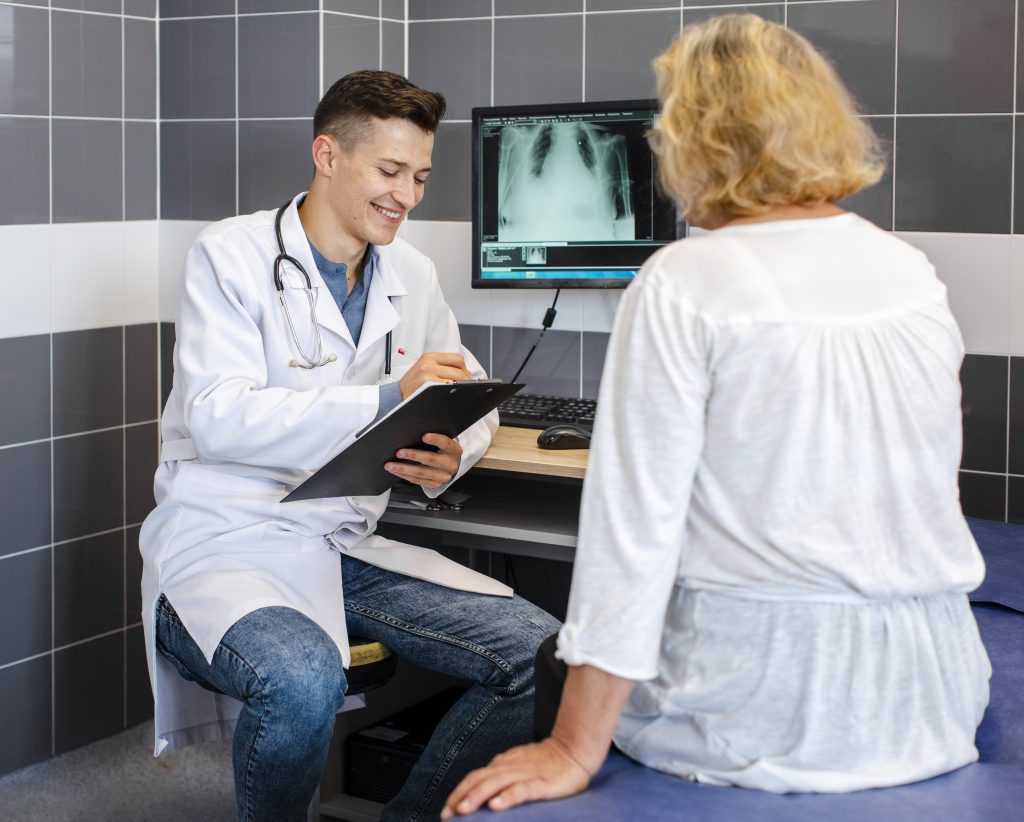 Patient receiving advanced non-surgical treatment such as PRP therapy or fluoroscopy-guided injection for joint pain.