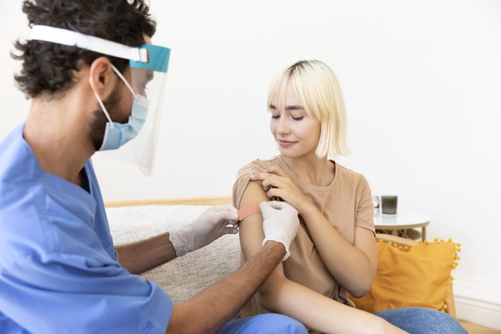 A clinical setting at Joint Health Solutions showing a patient receiving a high-dose micronutrient and antioxidant IV infusion for systemic inflammation.