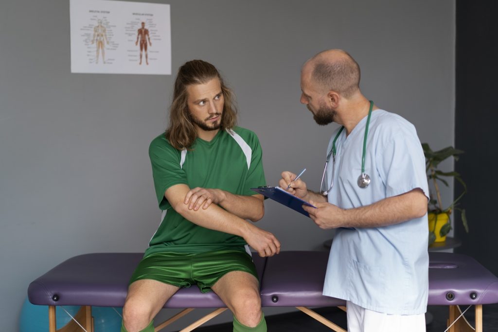 A physical therapist at Joint Health Solutions conducting an initial biomechanical assessment, measuring joint angles and muscle activation levels.