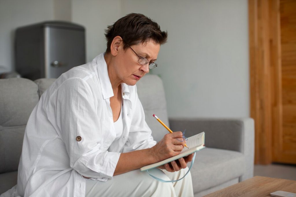 Physical therapy treatment planning with patient in Huntersville NC