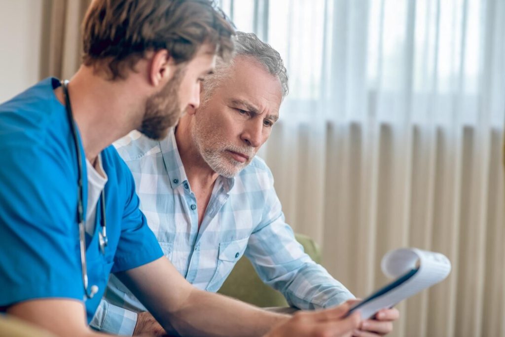 Medical provider discussing a personalized joint care plan with a patient