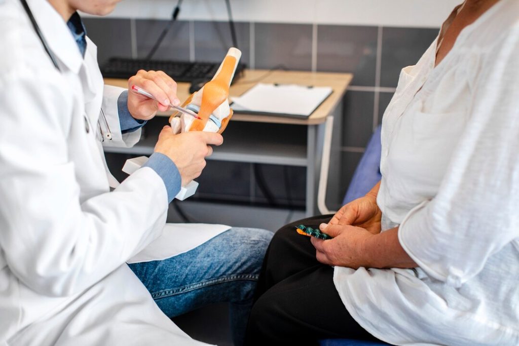 Medical provider discussing a personalized joint treatment plan with a patient