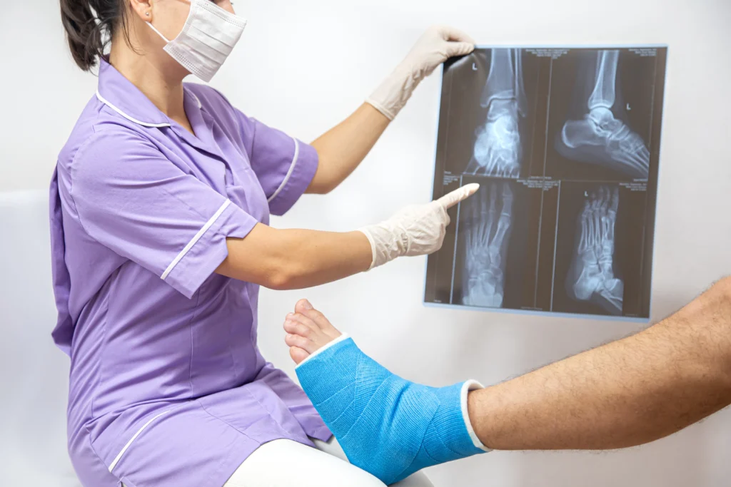 Medical provider reviewing a joint image with a patient near Mount Holly NC