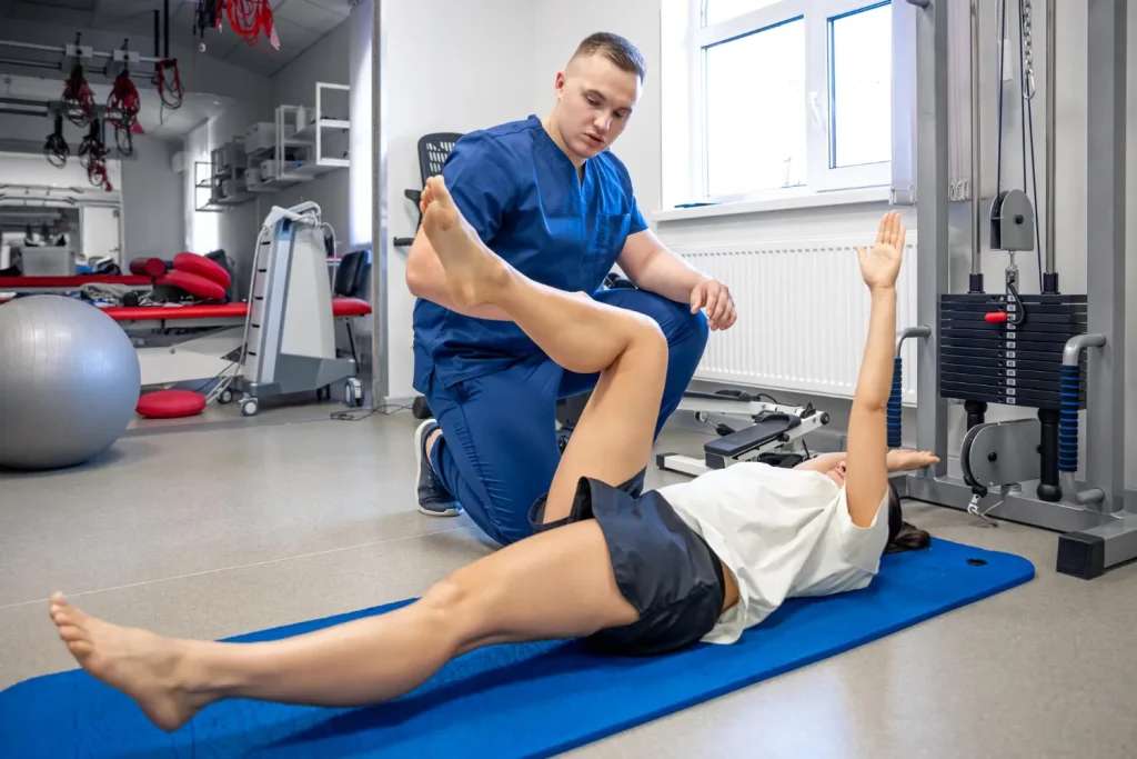 Healthcare professional providing non-surgical knee care for a patient from Huntersville NC